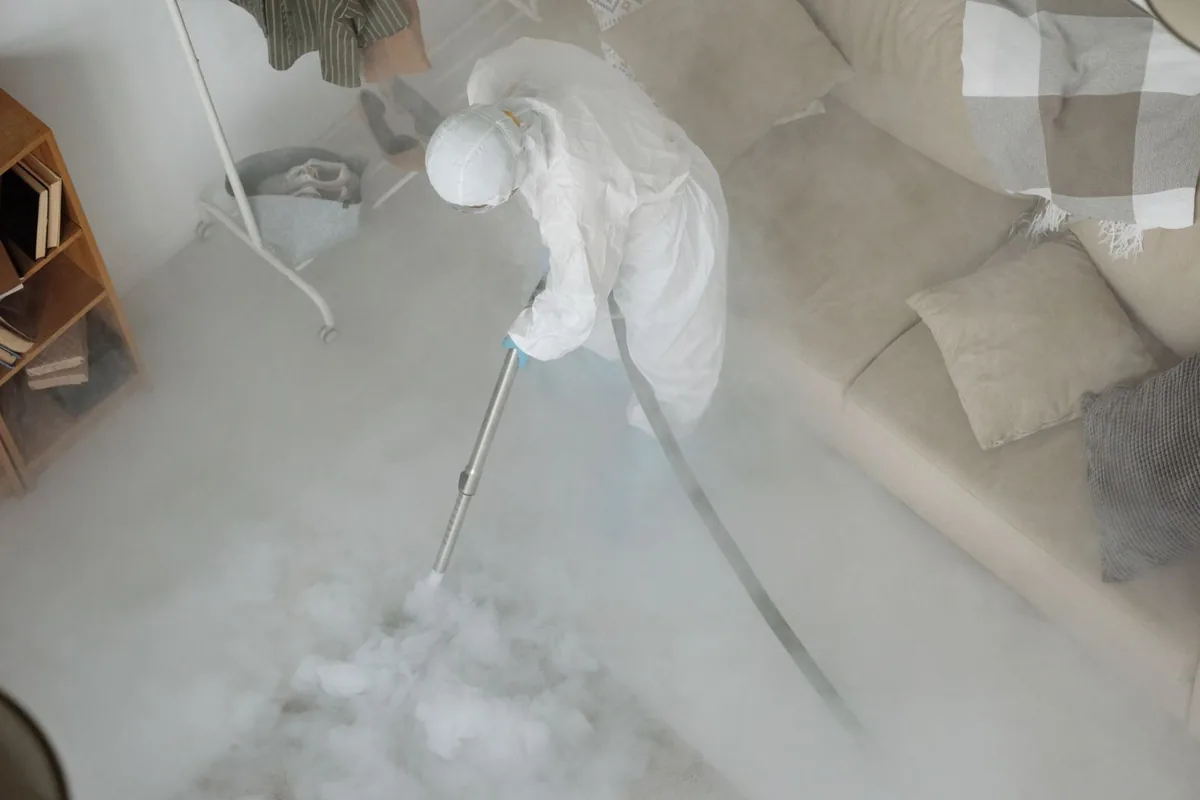 Biohazard cleanup technician in protective equipment, Des Allemands, LA